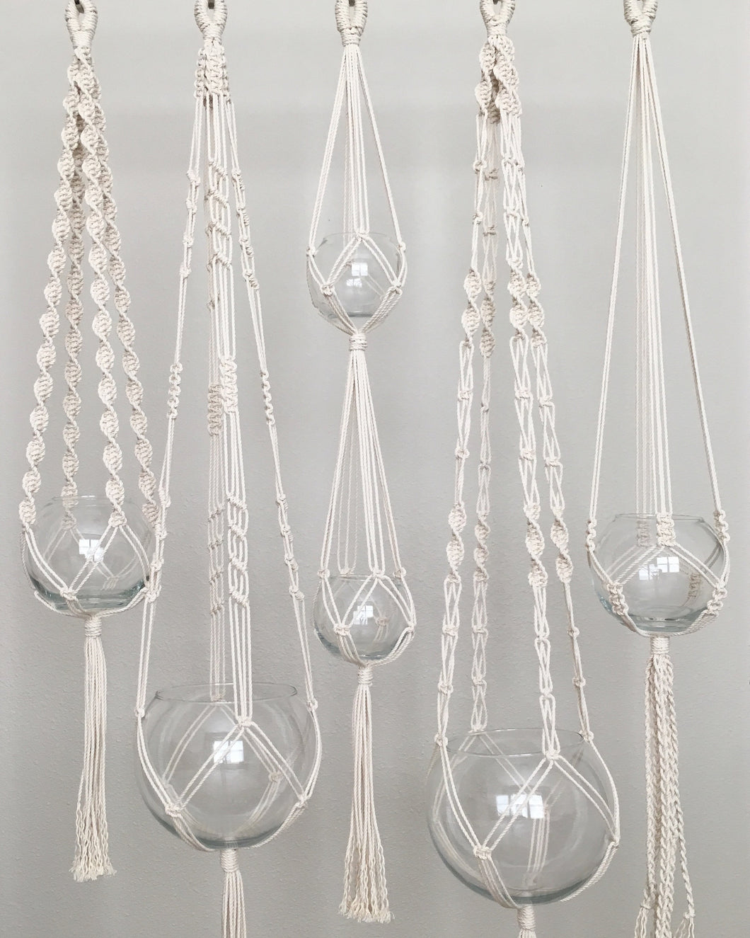 Set of 5 macrame plant hangers with glass vases included
